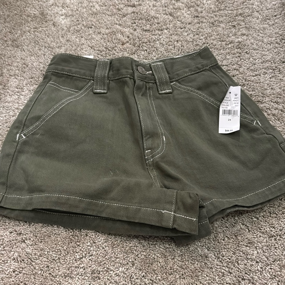 green jean shorts